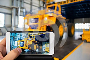 Big mining truck in the production shop of the car factory. photo