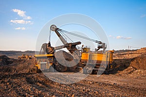 Big mining truck unload coal