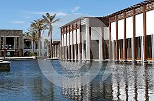 Big modern building and the blue pool.