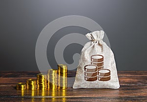 Big money bag and rising coins stacks. Accumulation of savings. Rise of sprofits. Incomes, increase salaries and wages. Financial