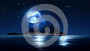 Big moon on night starry sky at sea mountains on horizon nature background