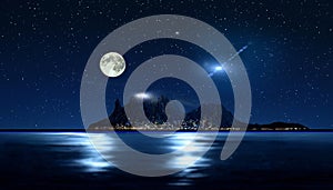 Big moon on night starry sky at sea mountains on horizon nature background