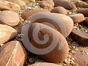 Big Natural Pink Pebbles At the sea beach