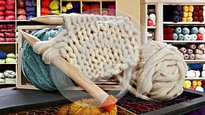 Big needles for knitting on a wool yarn shop