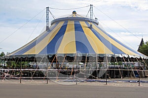 Big noname circus tent under a cloudy sky