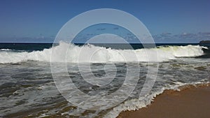 Big Pacific Ocean Waves at Lumahai Beach on Kauai Island, Hawaii.