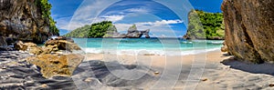 Big Panorama of idyllic tropical beach with small island and perfect azure clean water