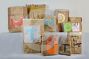 Big paper surprise bags with german lettering