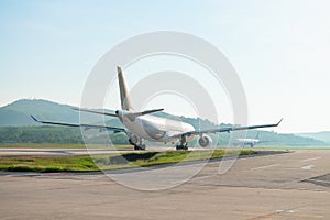 Big passenger airplanes on runway strip