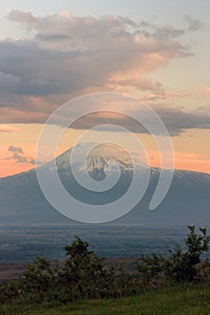 Big Peak of the mountain of Ararat in evening under the clouds