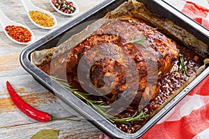 Big Piece of Slow Cooked Oven-Barbecued meat shoulder
