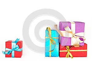 Big pile of colorful wrapped gift boxes isolated on white background. Mountain gifts. Beautiful present box with