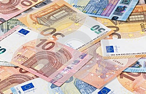 A big pile of euro banknotes. Many Euro bills lie on top of each other. Bunch of money of the European Union. Currency of the