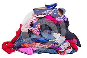 Big pile of old, used clothes isolated on white