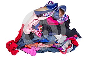 Big pile of old, used clothes isolated on white