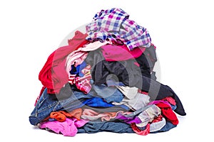 Big pile of old, used clothes isolated on white