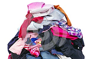 Big pile of old, used clothes isolated on white