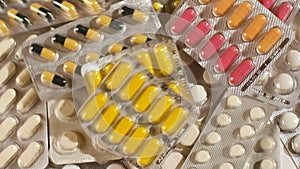 Big pile of pills sypitsya top. Many medications slou mo.