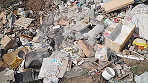 Big piles of garbage. Empty bottles, plastic in the waste dump. ecological disaster. environmental pollution.