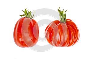 Big pink beef tomato isolated on white background