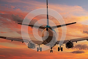 Big plane landing during sunset