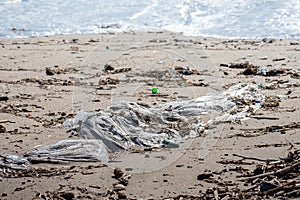 A big plastic bag in the beach