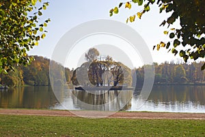 Big pond with an island, city park Tsaritsyno, season autumn