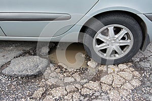 Big pothole caused by freezing and rain in Rome, Italy