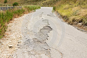 Big pothole on a national road in Sicily by landslide, carelessness and abandonment of road maintenance
