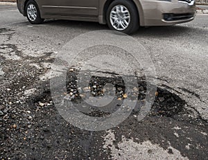 Big pothole in road