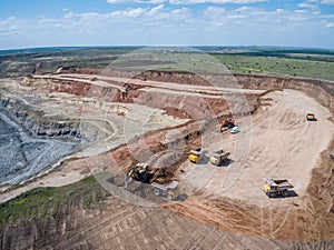 Big quarry, stone mining, equipment for working in quarries, aerial view.