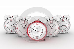 Big red alarm clock and alarm clocks on white