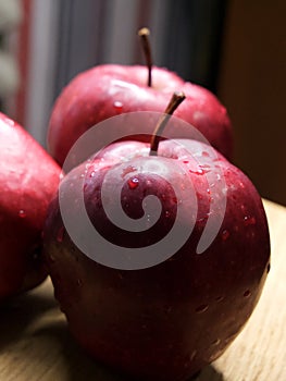 Big red apple. Close-up shot. Wet fruits