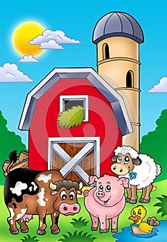 Big red barn with farm animals