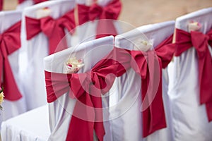 Big Red Bows on Wedding Chairs