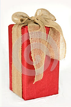 Big Red Christmas Gift Box Wrapped in Burlap Bow