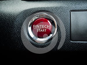 Big red Fintech button on the black background. photo