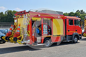 Big red fire truck with fire equipment