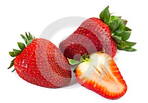 Big red juicy rich strawberries with pedicle