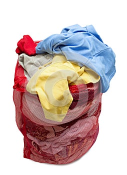 Big Red Mesh Laundry Bag Overflowing With Clothes photo