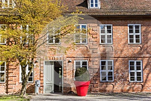 Big red pot in front of the Schleswig Holstein house in Schwerin