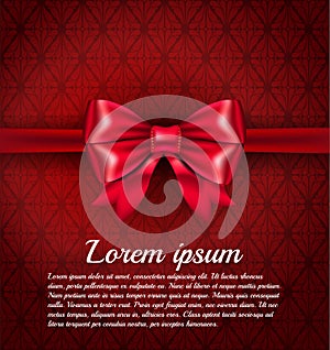 Big red ribbon bow on the rich classic red pattern background with place for your text. VIP Luxury red card template