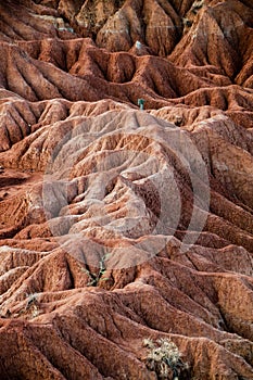 Big red sandstone rock formation in hot dry desert