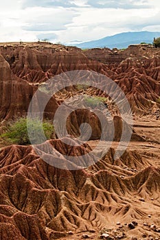 Big red sandstone rock formation in hot dry desert