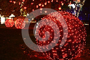 Big red shiny ball Christmas decorations in the park Rathaus