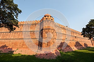 Big red wall of the red fortress in New Delhi on sunny day