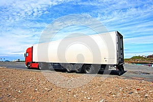 A big red and white lorry