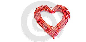 Big red wicker heart. On white background. Love