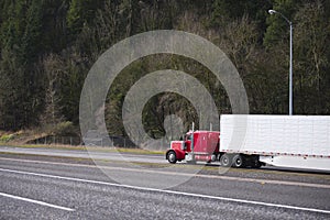 Big rig classic red semi truck with refrigerator semi trailer ru