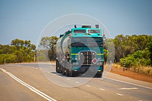 Big Road Train in the Australian Outback with trailer bringing fuel to gas